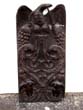 A wonderful early 19th century carved plaque, possibly from Pennsylvania, depicting a spread wing eagle and Adam & Eve.